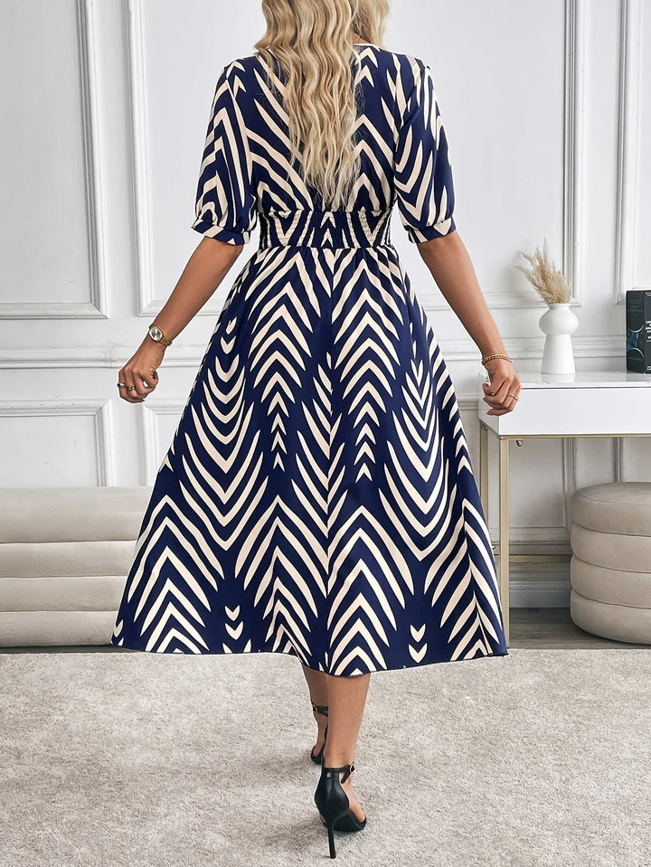 Elina – Geometric Flow Midi Dress